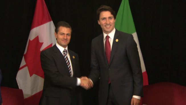 El primer ministro de Canadá visita México y dice estar por "no abandonar el TLC"