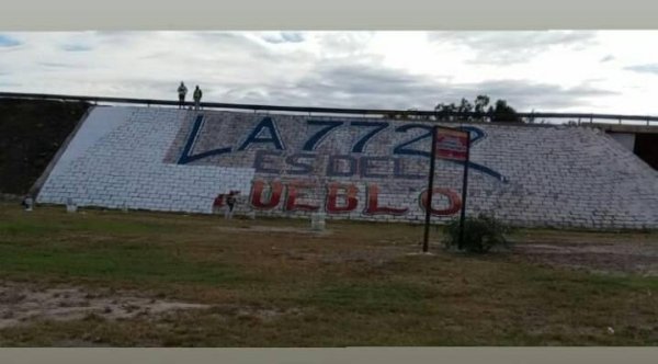 La municipalidad de San Martín borra mural por la Ley 7722